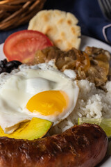 Close up of Bandeja paisa, typical food of Colombia.