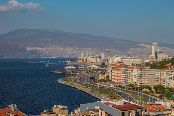 Naklejka premium Cityscape with sea, sky and sunshine