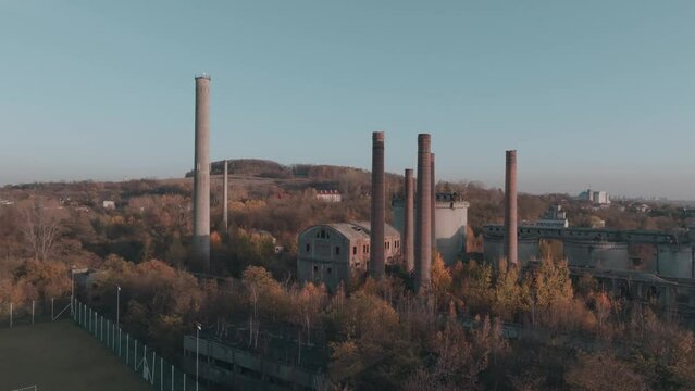 Abandoned old production plant, cement plant in Bedzin, Grodzisk, Poland. Concept of abandoned places, industrial ruins, urbex. View from the drone, air.