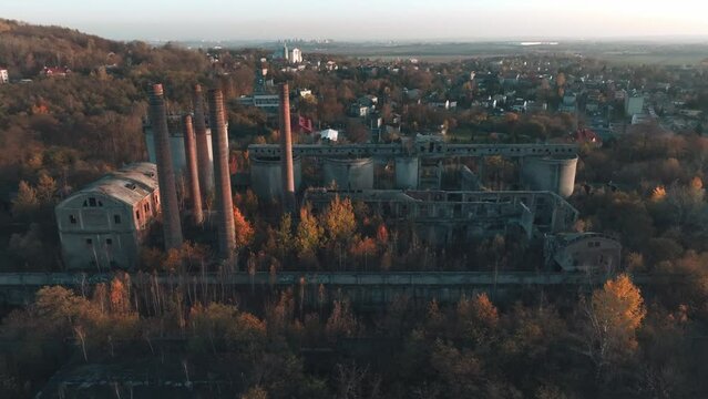 Abandoned old production plant, cement plant in Bedzin, Grodzisk, Poland. Concept of abandoned places, industrial ruins, urbex. View from the drone, air.