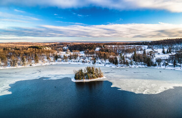 island on a lake in the winter