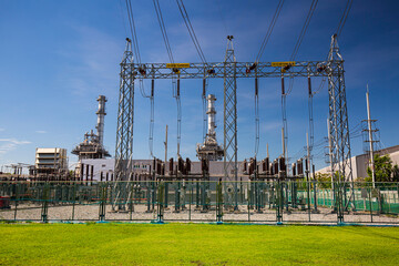 Column high voltage transformer against the field green. Electric current redistribution substation