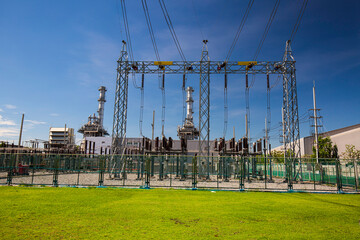 Column high voltage transformer against the field green. Electric current redistribution substation