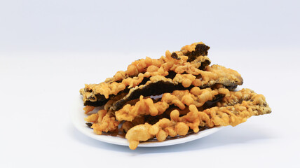Seaweed sheets that are coated with batter and fried