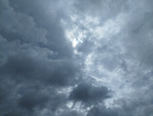 View of overcast sky. Dramatic gray sky and white clouds before rain in rainy season.