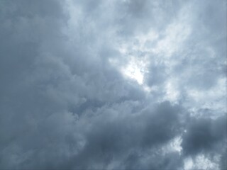 View of overcast sky. Dramatic gray sky and white clouds before rain in rainy season.