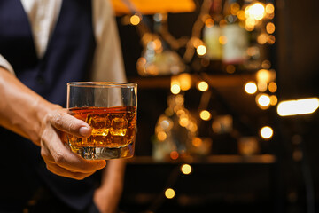 Bartender pouring Whiskey, on  bar,