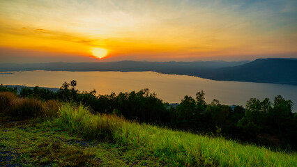 Obraz premium Lam Ta Khong Dam view point that can see the road below and the river of the dam beautifully.