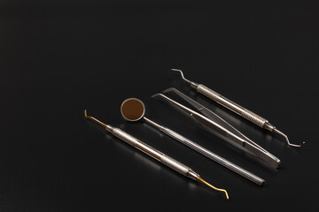 Set of metal dental instruments for teeth dental care