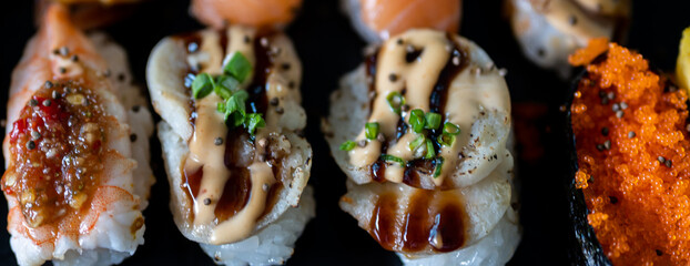 Chef cooking sushi in the kitchen