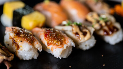 Chef cooking sushi in the kitchen
