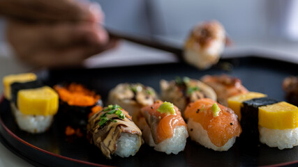 Chef cooking sushi in the kitchen