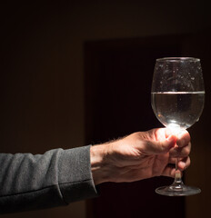 glass of wine on a dark background