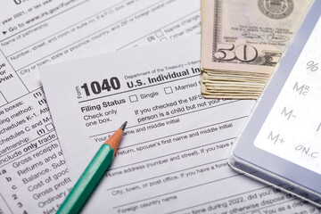 Income tax with instruction. Tax payment and filing concept