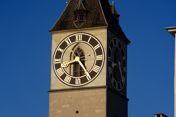 Church tower with largest church clock face in Europe of medieval church St. Peter at the old town...