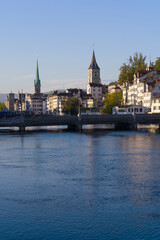 Beautiful cityscape of the old town of Zürich with church towers and Limmat River in the...