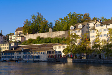 Scenic view of the old town of City of Zürich with Limmat River and historic houses on a sunny late summer morning. Photo taken September 22nd, 2022, Zurich, Switzerland.