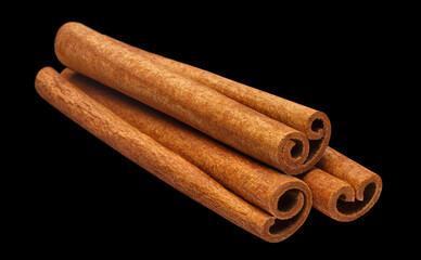 Cinnamon sticks, isolated on black background