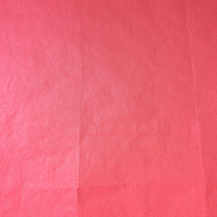 Fototapeta premium Pink crumpled background paper texture. High quality background and copy space for text.