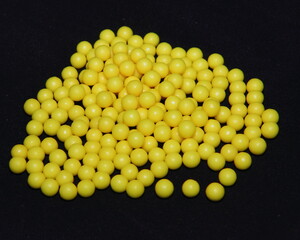 Vitamin ascorbic acid on a black background