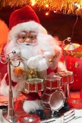 santa - the drummer heralds the coming of christmas, close-up