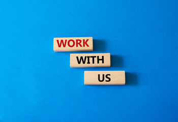 Work with us symbol. Wooden blocks with words Work with us. Beautiful blue background. Business and Work with us concept. Copy space.