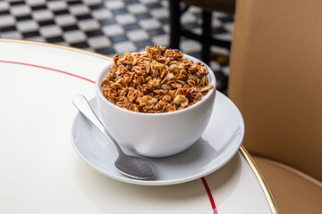 Granola with yogurt in a cup