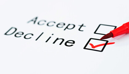 Closeup check boxes accept or decline with pen