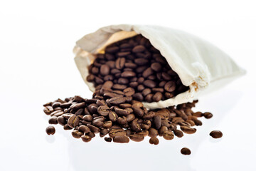 Coffee beans in bag isolated on white background