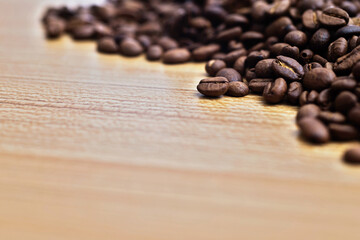 Coffee beans on wooden table