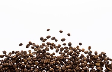 Large group of coffee beans isolated on white background