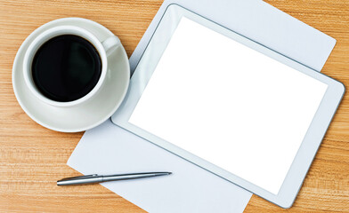 Obraz na płótnie Canvas Digital tablet and a cup of coffee on the desk