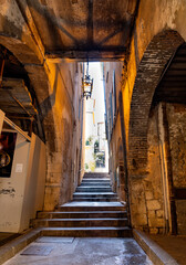 Historic XIII century Rue Obscure Dark Covered Street underground passageway under harbor front houses in old town quarter of Villefranche-sur-Mer in France