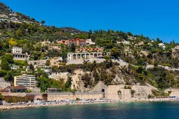 Photo sur Plexiglas Villefranche-sur-Mer, Côte d’Azur Panoramic view of harbor and beach onshore Azure Cost of Mediterranean Sea in Villefranche-sur-Mer resort town in France