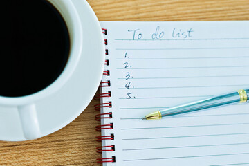 To do list with pen and coffee