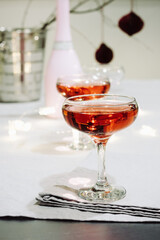 Glass of sparkling wine, rose champagne.