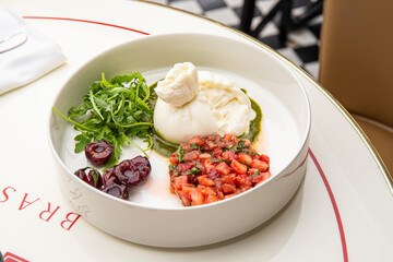 Burrata with strawberries, basil and cherries