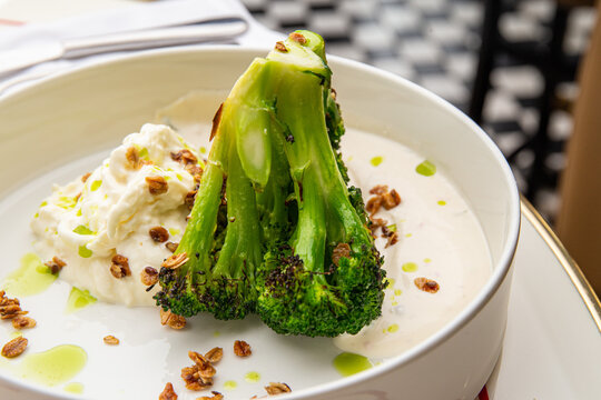 Baked broccoli with sauce and chilli