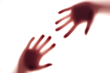 Blurred shadows of hands behind glass, concept of ghosts, zombies, walking corpses