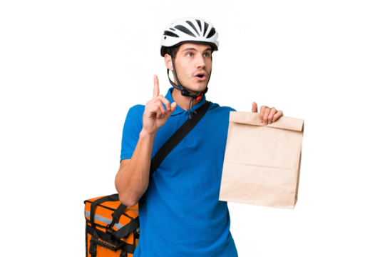 Young caucasian man taking a bag of takeaway food over isolated background thinking an idea pointing the finger up