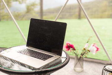 laptop in the dome camping