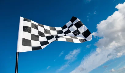 Stof per meter Checkered flag on blue sky © xy
