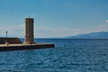 lighthouse on the coast of the sea