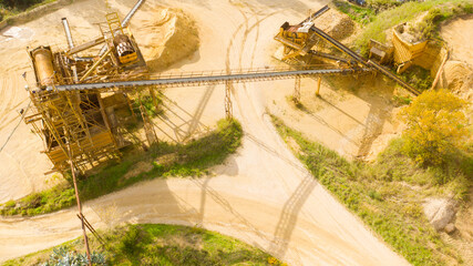 Aerial view of a plant for crushing and sorting aggregates. Machine for screening, transport and...