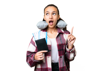 Young Traveler woman holding a passport over isolated chroma key background thinking an idea pointing the finger up