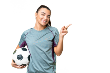 Young football player Woman over isolated chroma key background pointing finger to the side