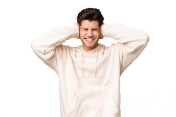 Young caucasian handsome man over isolated background frustrated and covering ears