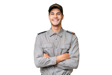 Young security man over isolated background keeping the arms crossed in frontal position
