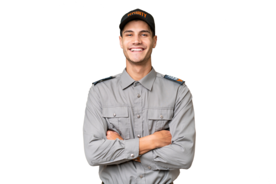 Young security man over isolated background keeping the arms crossed in frontal position