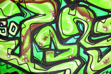 Colorful background of graffiti painting artwork with bright aerosol strips and beautiful colors....